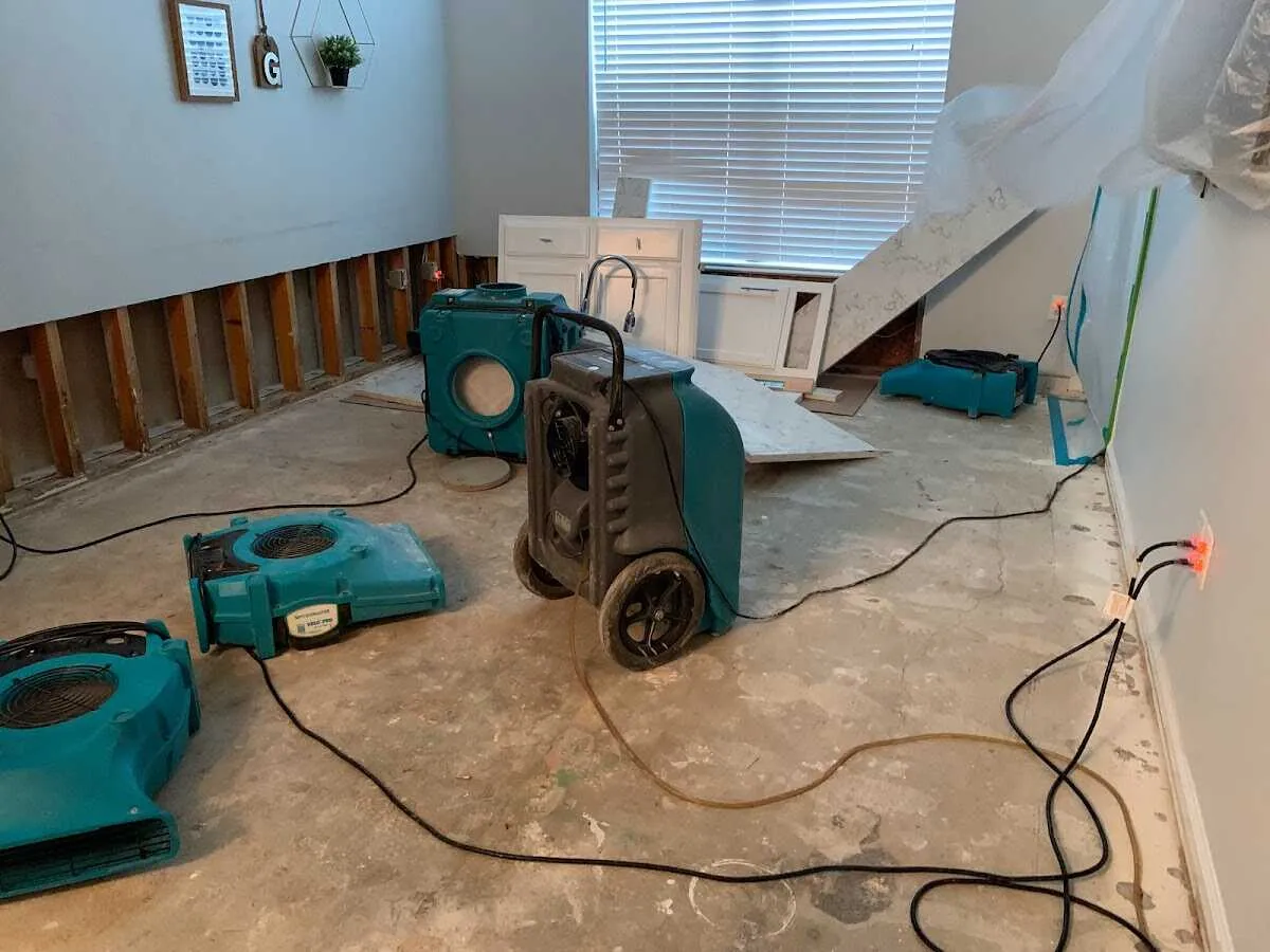 Dehumidifier in flood-cut room for Water Damage Restoration in Chevy Chase